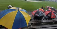 CricketFans-InRain1-27-0826